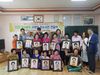 장성공공도서관 장수사진 전달식 가져